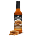 Syruvia salted cookie butter bottle with cookies on a white background